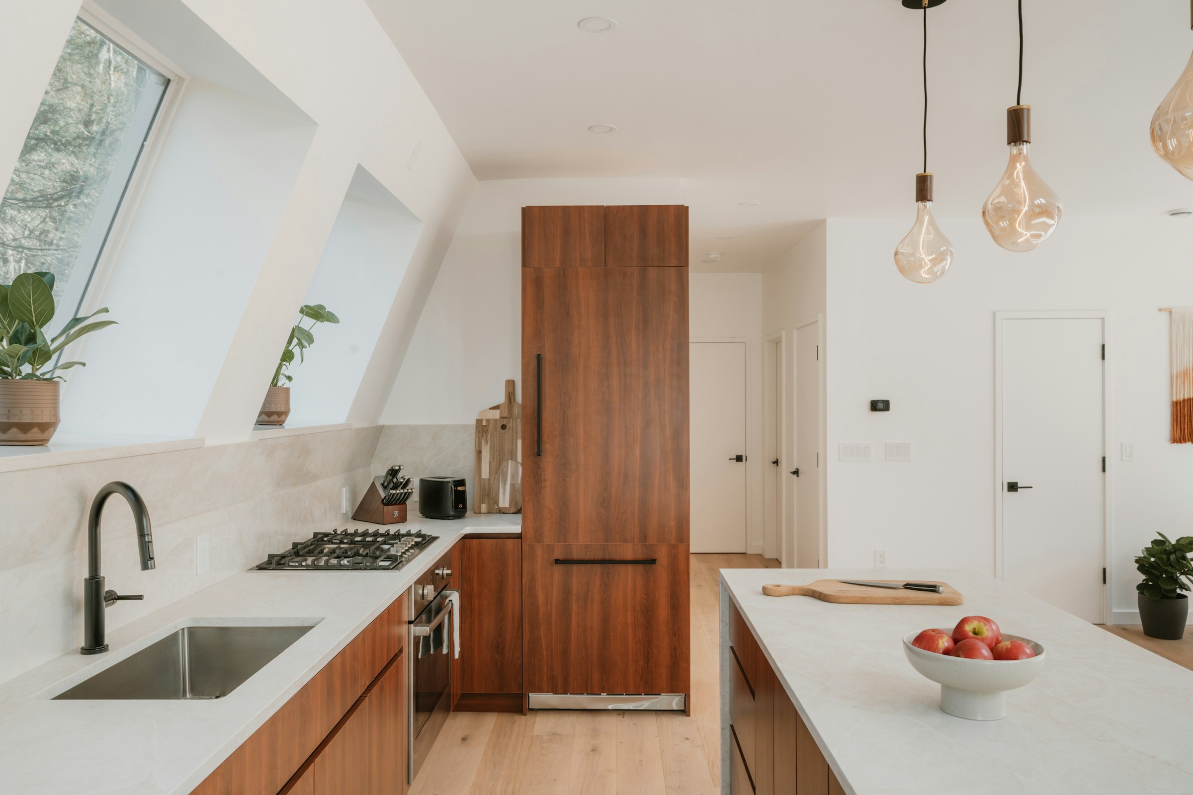 Warm wood-toned modern kitchen interior